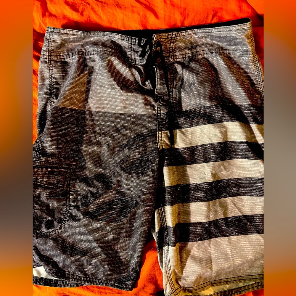 O’Neill board shirts. Black/grey/white. Only worn once. Size 32.